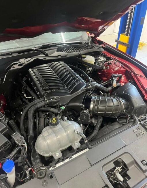 Introducing the Ultimate Supercharger Solution: The Gen 6 3.0L Stage 1 System Elevate your driving experience with the most potent and comprehensive supercharger system on the market, now featuring the unparalleled Gen 6 3.0L Supercharger as standard. This is the same cutting-edge technology used in the 2018 Ford Cobra Jet, setting a new benchmark for performance and engineering excellence. Whipple Superchargers is proud to present the pinnacle of supercharging technology. Our latest offering is not only the most advanced and powerful but also maintains compliance with 50-state emissions standards without compromising on quality. The 5th generation Whipple 3.0L supercharger boasts a newly designed rotor profile and an enhanced high flow rotor housing, unlocking unprecedented power levels. The Stage 1 Whipple System is a marvel of engineering excellence, perfectly blending performance with efficiency. Featuring the groundbreaking 3.0L supercharger at its core, this system incorporates the high-flow fuel injectors found in our Stage 2 setup, tailored to work seamlessly with the stock 80mm throttle body. Enhanced cooling efficiency is achieved through an upgraded intercooler pump and our proprietary dual-core, dual-pass intercooler design, setting new standards for temperature reduction and system effectiveness. The outcome? An astonishing boost to 750 engine horsepower and 620 foot-pounds of torque, all on 93 octane fuel. This significant surge in power ensures your vehicle asserts its dominance on any road, offering an exhilarating driving experience that's simply unmatched. Whipple Superchargers stands unrivaled in its commitment to innovation, meticulously crafting systems that achieve unmatched power efficiency. Our signature twin-screw supercharger, together with a colossal air-to-water intercooler and the Crusher air system, guarantees both reliability and exceptional power delivery. From the instant you depress the pedal, you feel the surge all the way to the redline. Featuring our groundbreaking patented dual intercooler core with dual pass technology, it ensures your Mustang remains at the pinnacle of performance by double cooling the supercharged air. This innovation, coupled with the remarkable gains in horsepower and torque, transforms your vehicle into an exhilarating yet dependable powerhouse. Our systems are engineered for both the daily driver seeking added performance and the enthusiast desiring a street-dominating machine. The Whipple Supercharger system promises exhilarating power across the entire RPM range, with exceptional drivability. Thanks to decades of OEM and racing experience, Whipple has created a unique PCM calibration that optimizes all necessary engine functions, including fuel, spark, and torque management. This ensures your engine operates within optimal parameters, safeguarding performance and reliability. Each kit includes a bespoke software package and an OBDII flash tool, allowing for easy updates. The included HP Tuner RDT tool offers powerful data logging capabilities, along with the ability to adjust wheel/axle size and perform critical engine relearns. Choose Whipple Superchargers for unmatched performance and reliability, and unleash the full potential of your vehicle today. This kit is 50 State Legal, CARB EO: D231-55 WHIPPLE SUPERCHARGERS S550 EXCLUSIVE FEATURES 50-state legal No other upgrades required, just massive power right out of the box (nearly double the stock horsepower) Inverted front entry W185ax (3.0 liters) Whipple twin-screw supercharger that significantly outperforms competitions 1.9L and 2.3L roots-type systems (front entry design can be up to 8% more efficient than a side/rear entry) 3.0L is 30% larger than 2.3L roots-type allowing lower power consumption and lower discharge temps to flow the same amount of air (more power to the rear wheels) Oversized Crusher™ inlet for maximum airflow capacity and minimal rotor cavitation (unique Roval 150mm inlet) Front feed allows for oversized intercooler core compared to other smaller intercooler cores giving Whipple lower air charge temps which allows more boost and timing to be run on pump gas Patented dual core, dual pass intercooler system for industry leading air temps Largest air-to-water aluminum bar-plate intercooler in the industry (over 33% larger than competition) offers more cooling than any other positive displacement system available, nothing comes close Massive oversized aluminum intercooler reservoir (over 2 gallons) holds more than double any competitors IC water system allowing longer more consistent power levels vs. competition Whipple Superchargers massive oversized intercooled air-bypass system for industry leading reduction of burst knock and incredible fuel economy Included HP Tuner RDT flash tool 55LB/HR fuel injectors vs others 47LB/HR that others use which severely limits power potential Self-contained oversized oil system for dramatically reduced oil temps in even the most demanding conditions More boost at the "hit" than any other twin-screw Flat torque curve for incredible acceleration Oversized heat exchanger for incredible intercooler water temps, 150% more volume then competition, standard with every kit No cutting or grinding on the engine block No cutting or grinding the K-brace No internal modifications required Completed installation looks factory installed, not some cobbled together kit with multiple billet adapters Kits come complete with all necessary parts and hardware for installation Plug and play wiring with male and female connections Proven 6-rib belt system with heavy duty spring loaded tensioner and adjustable idler system Optional 10-rib belt system with matching billet pulleys Available in wrinkle black, polish, Ford textured blue or any custom color Easily upgradeable with bigger intercooler pumps, dual electric Spal 11" high speed fans, optional supercharger pulleys Instant boost at the touch of the throttle 3 minute pulley changes Easy belt changes Lightweight pocketed aluminum SC pulley Spark plugs included